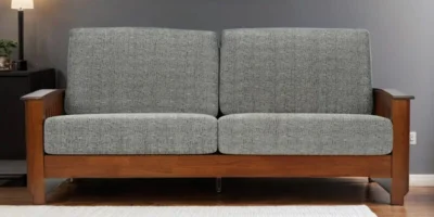 Comfortable Wooden Frame Sofa with Three Cushions and Neutral Fabric