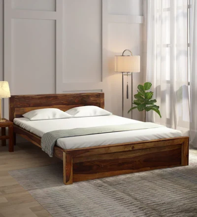 Stylish contemporary double bed made of polished wood with a gently curved headboard and clean minimalist design.