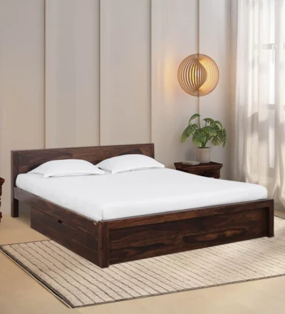 Sheesham wood bed frame featuring under-bed drawers for storage.
