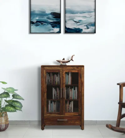 Premium solid Sheesham wood bookshelf featuring elegant carved floral motifs, smooth polish, and spacious open storage shelves.