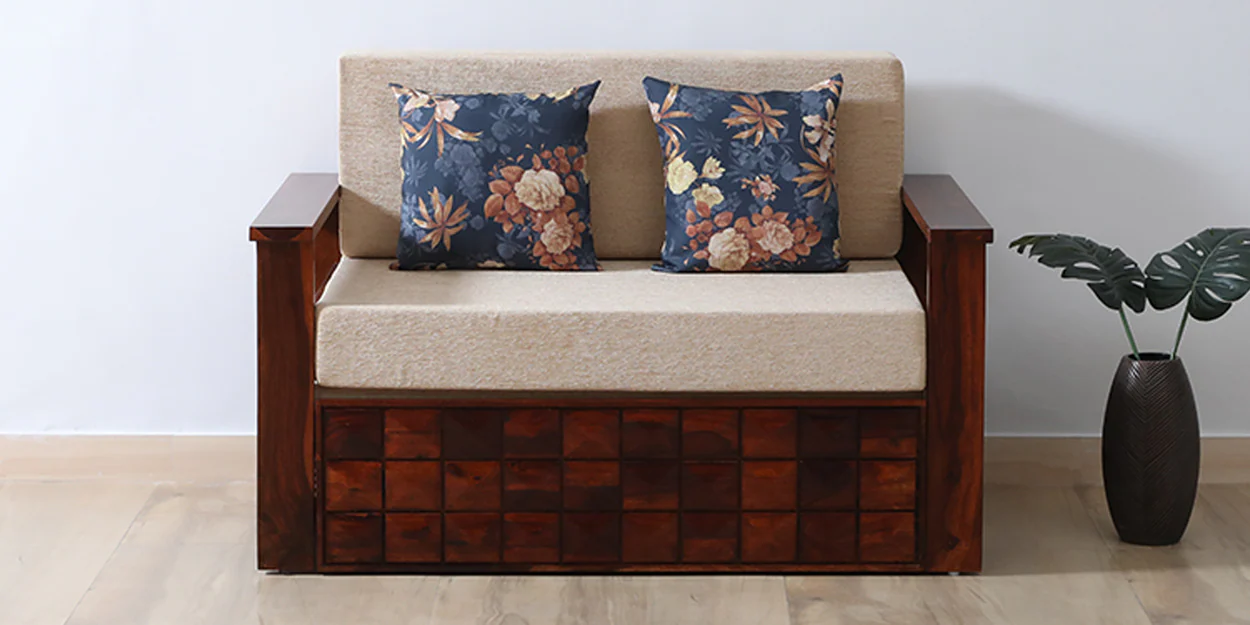 Classic sofa cum bed featuring premium cushions, smooth pull-out bed frame, and sturdy construction for living room comfort.