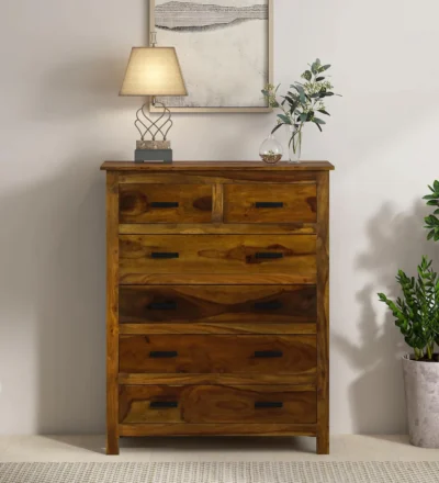 Glowline chest of drawers crafted from solid Sheesham wood with natural wood texture and multiple spacious storage drawers.