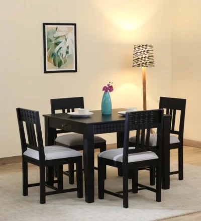 Wide Sheesham dining table with slatted back chairs for kitchen use.