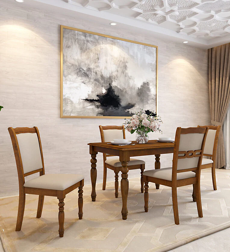 Premium teak dining furniture featuring a smooth tabletop and elegant seating.