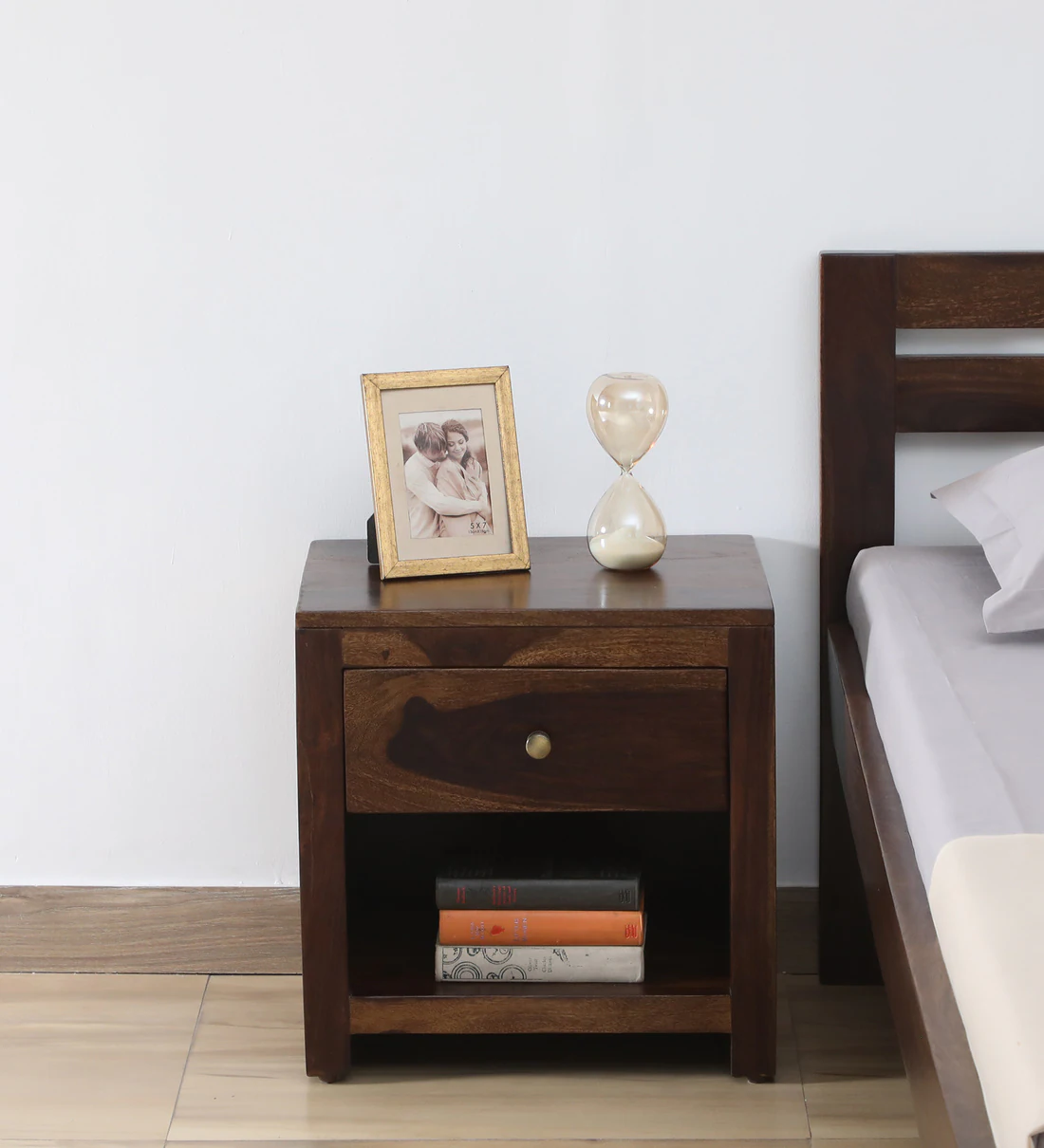 Wooden nightstand with single drawer and open storage shelf