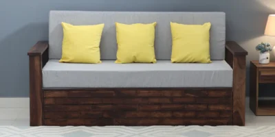 Solid Sheesham wood sofa bed featuring dual-use functionality, strong durable frame, and stylish wooden finish for modern homes.