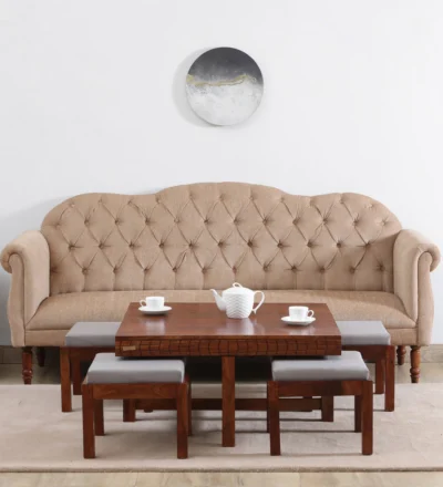 Solid Sheesham wood comfortable nesting coffee table with padded stools.